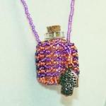 Necklace Beaded Fairy Bottle In Purple And Orange..