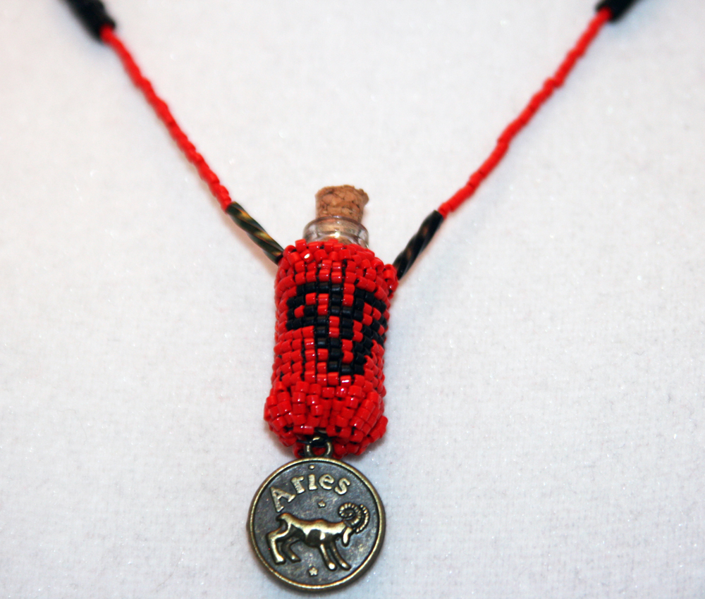 Beaded Bottle Aries Necklace In Red And Black With Medallion