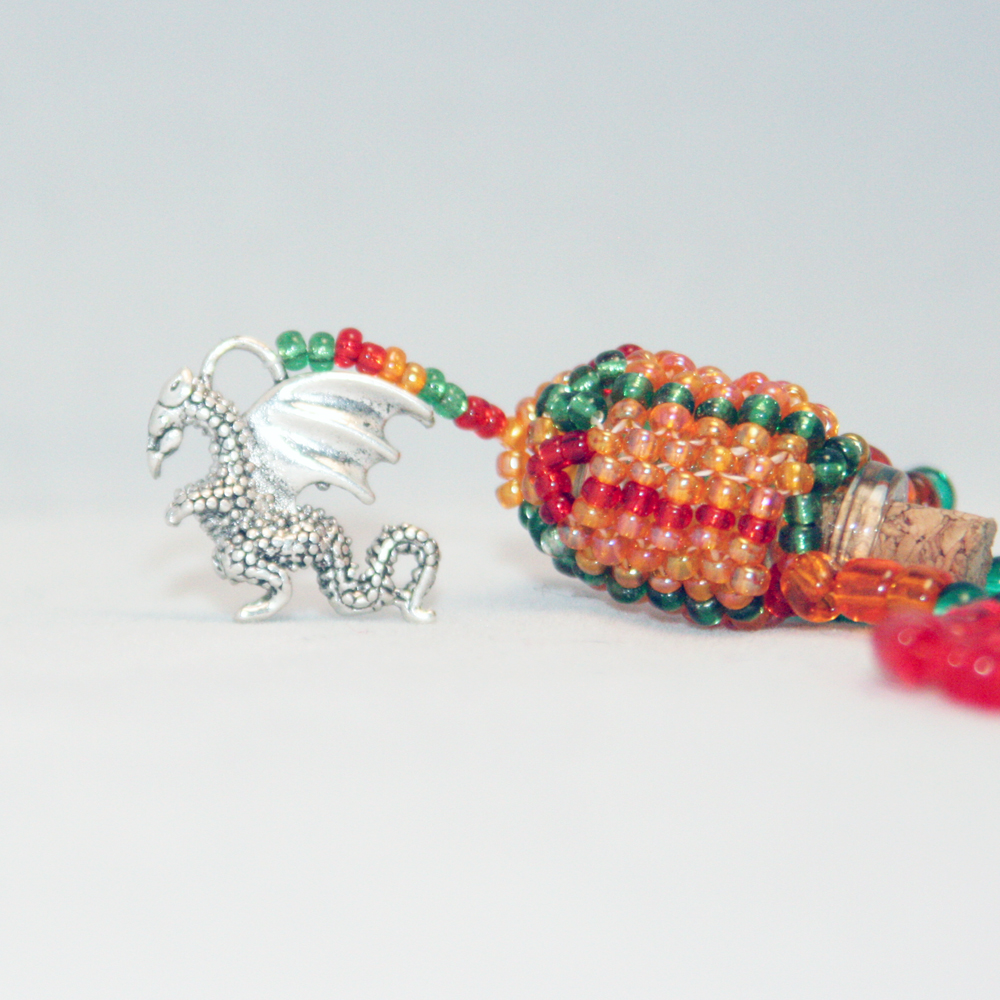 Beaded Bottle Dragon Necklace In Red, Green, And Orange
