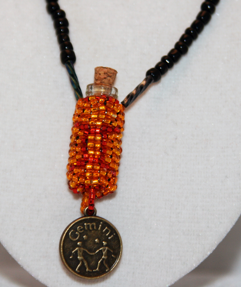 Beaded Bottle Necklace For Red, Amber, And Black With Gemini Medallion
